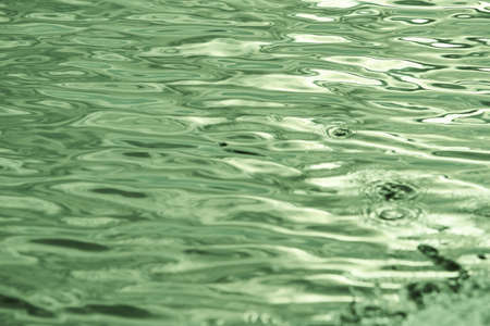 Sunlight reflecting in glittering sea. sparkling in water with beautiful texture