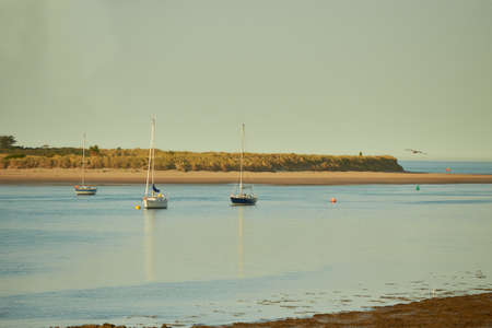 Boats in harbor at the sunset.