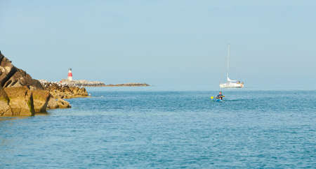Dublin, Ireland - 06.01.2021: Healthy lifestyle kayaking in the sea. An enthusiast canoeing on a...