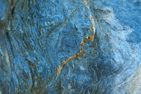 Blue Marble texture background floor decorative stone interior. natural pattern of marble background, Surface rock stone with a pattern of Emperador marble, Close up of blue abstract texture.の写真素材