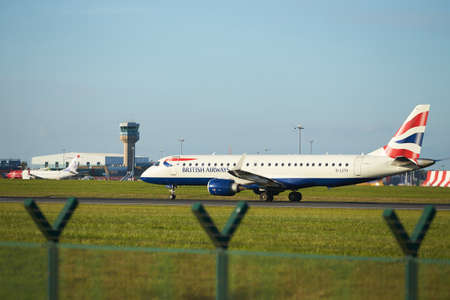 Dubli, Ireland - 10.11.2021: British Airways airplane on the Dublin airport. Commercial airplane jetliner landing in beautiful sunset light. Flight travel transport airline background concept.のeditorial素材