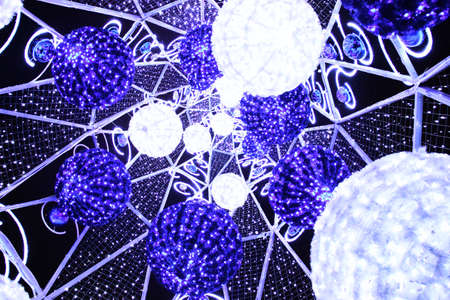 Holiday blue background, glitter, light effect, party. Color light abstract background with circle...