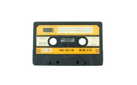 Audio compact cassette. Audio cassette on a white background, front view. analog format for audio...