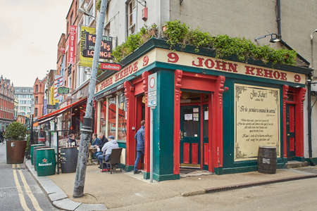 Dublin, Ireland - 04.10.2022: The Pub landmark in Dublin's cultural quarter visited by thousands of tourists every year. People around The pub.のeditorial素材