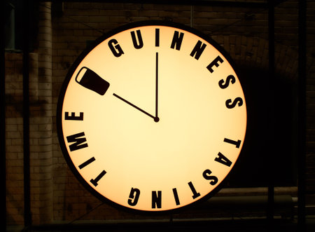 Dublin  Ireland - 08 31 2022: Old historical clock in the museum of Guinness Storehouse.のeditorial素材