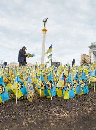 Kyiv, Ukraine - 03.27.2023: Independence Square with yellow and blue flags in memory of the fallen defenders of Ukraine in war time in Kyiv, Ukraineのeditorial素材
