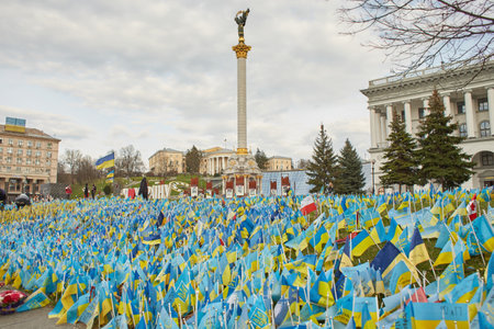 Kyiv, Ukraine - 03.27.2023: Independence Square with yellow and blue flags in memory of the fallen defenders of Ukraine in war time in Kyiv, Ukraineのeditorial素材