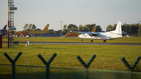 Dubli, Ireland - 10.11.2021: Ryanair airplane on the Dublin airport. Commercial airplane jetliner landing in beautiful sunset light. Flight travel transport airline background concのeditorial素材