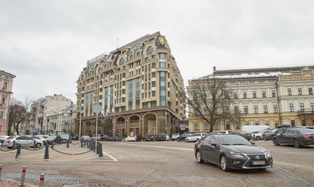 Kyiv, Ukraine - 03.29.2023: A street of Ukraine capital in war time. Cars, people and historical buildingsのeditorial素材
