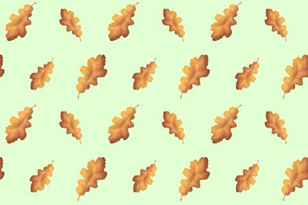 Pattern of autumn dried oak leaves on a light background. Without Borders.Textiles, packaging.の写真素材
