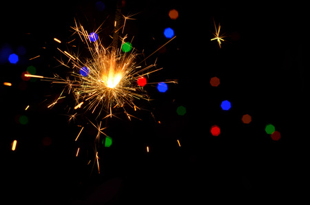 Sparkler on bokeh background. Christmas sparkler.の写真素材