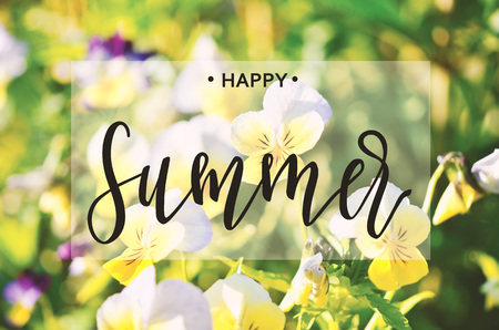Happy Summer inscription on the background of flowers.の写真素材