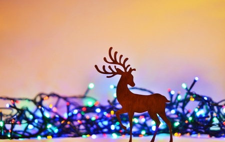 Christmas background with deer silhouette.の写真素材