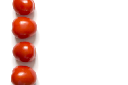 Fresh tomatoes isolated on white background.の写真素材