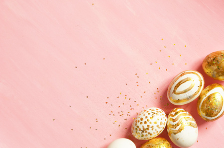 Top view of easter eggs colored with golden paint in differen patterns. Copy space. - Imageの写真素材