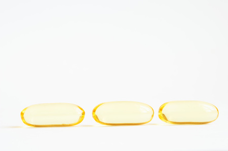 Omega 3 fish oil capsules. Concept of healthcare.  Copy space.の写真素材