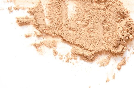 Beige crashed face powder for makeup as sample of cosmetic product, isolated on white background - Imageの写真素材