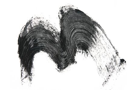 Black mascara brush strokes isolated on white. - Image