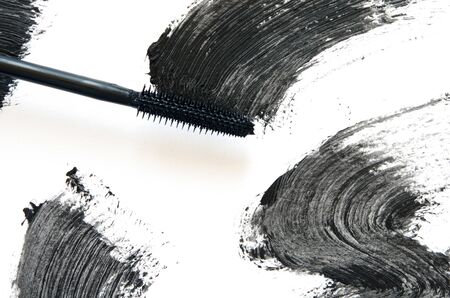 Stroke of black mascara with applicator brush close-up, isolated on white background. - Imageの写真素材