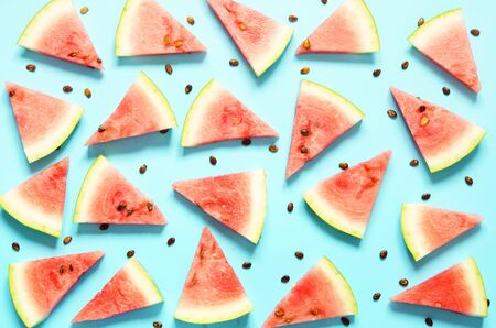 Fresh red watermelon slice Isolated light blue background.  Summer concept.Top view, Flat lay. - Imageの写真素材