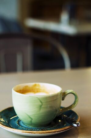 Cappuccino or Latte art coffee made from milk on the table in coffee shop. Soft focus. - Imageの写真素材