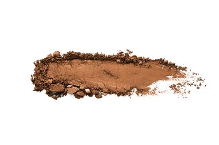 Eyeshadow sample isolated on white background. Crushed brown metallic eyeshadow. The concept of fashion and beauty industry. Copy Space. - Imageの写真素材
