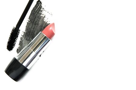 Lipstick and mascara on white background. The concept of fashion and beauty industry. Close up. - Imageの写真素材