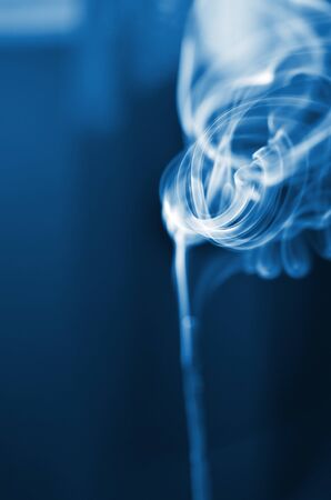 The smoke from the incense sticks. Abstract art. Soft focus. Color of the year 2020 Classic Blue. - Imageの写真素材