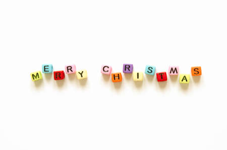 Words "merry christmas" with colorful iblocks solated on a white backgroundの写真素材