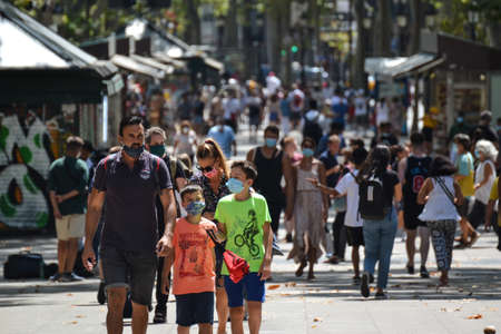 Barcelona, Spain, August 8, 2020: Family wearing protective medical masks for prevent virus Covid-19 in Barcelona, Spain, Europeのeditorial素材
