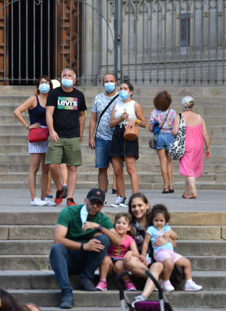 Barcelona, Spain, August 24, 2020: Caucasian tourists wearing protective covid-19 face mask. Touristy spots in the covid eraのeditorial素材