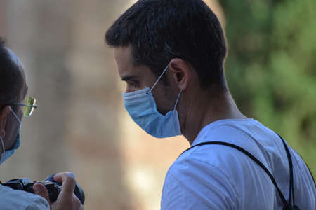 Barcelona, Spain, August 24, 2020: Caucasian man wearing protective covid-19 face mask. Touristy...