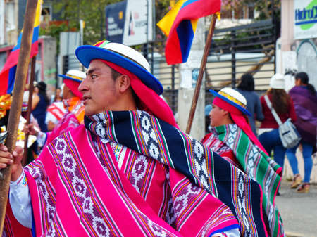 Cuenca, Ecuador-September 21,2019: Celebration of the Killa Raymi or the Andean festival of the moon in Cuenca. Men folk dancers represent culture of the region Sierra (mountains) in traditional dressのeditorial素材