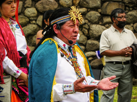 Chobshi, Azuay province, Ecuador - June 21, 2021: Celebration Inti Raymi at Chobshi archeological site of ancient ruins of Cacique Duma Ð¡astle. Shaman conducts spiritual indigenous ceremony Chacanaのeditorial素材