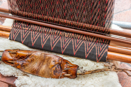 Details of equipment and sample of scarf made in technic called Ikat. Traditional way to handmade...