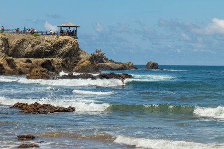 Salinas, Ecuador - March 20, 2023: Viewpoint "La Loberia" on the Santa Elena Peninsula, a coastal marine life reserve with a sea lion colony on the island and a surf area. Pacificのeditorial素材