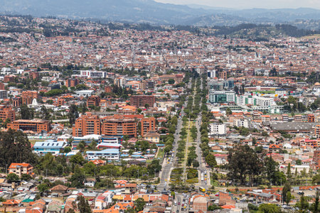 Panoramic view from above of the city of Cuenca in the valley from the Turi viewpoint, the southern hill of the city. Ecuadorの写真素材