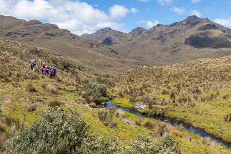 El Cajas National Park in the Ecuadorian Andes. Mountain landscape. Hikers on the trail at altitude above 4000 m above sea level. Azuay Provinceの写真素材