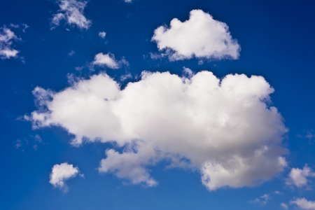 White clouds against the blue skyの写真素材