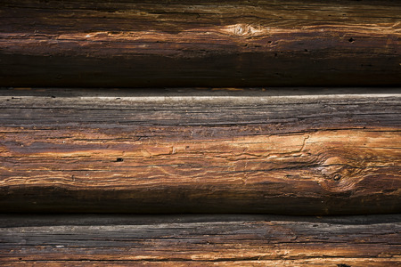 Fragment of wall of the old wooden building.の写真素材