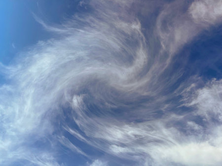 tthere are soft fluffy clouds in the sky here are soft fluffy clouds in the skyの写真素材