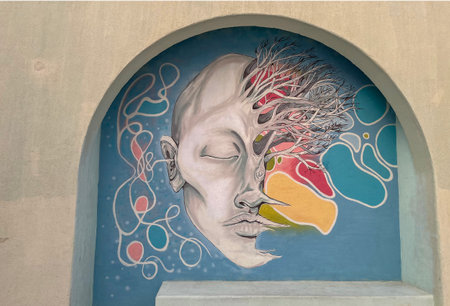 A colored mural on the wall of a house in the Mina area of Doha, Qatarの写真素材