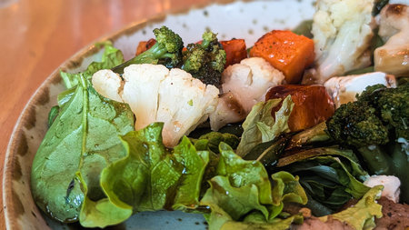 Roasted vegetable salad with broccoli, cauliflower, and pumpkinの写真素材