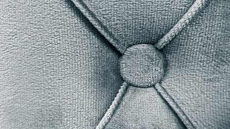 Macro Shot of Grey Velvet Upholstery with Buttoned Tufting Detail