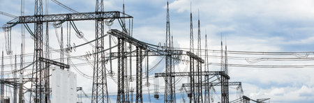 High voltage post. High-voltage tower sky background.