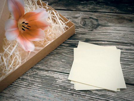 Tulip  flower  on dark barn wood planks background. Empty space for copy, text, lettering. Postcard,...