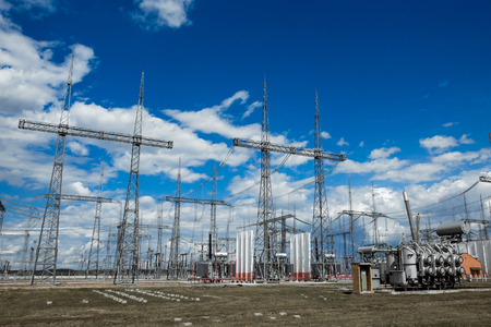 High voltage post. High-voltage tower sky background. の写真素材