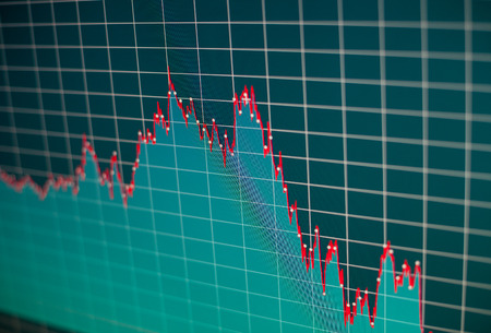 Financial graph on a computer monitor screen. Background stock chart.の写真素材