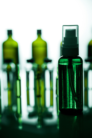 Group object of liquid medicinal agent in limpid glassware in medical laboratory. Group of ampoules with a transparent medicine in medical laboratoryの写真素材