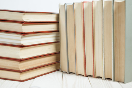 Pile of old books stacked on top of each other. Selective focus with copy spaceの写真素材